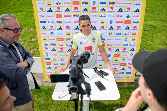 Goalkeeper Zecira Musovic is being interviewed