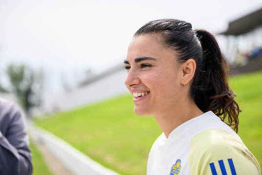 Goalkeeper Zecira Musovic is being interviewed