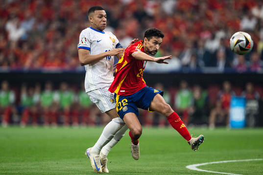 Kylian Mbappé of France and Jesus Navas of Spain