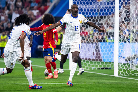 Randal Kolo Muani of France celebrates