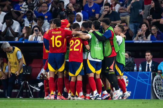 Lamine Yamal of Spain celebrates with team mates