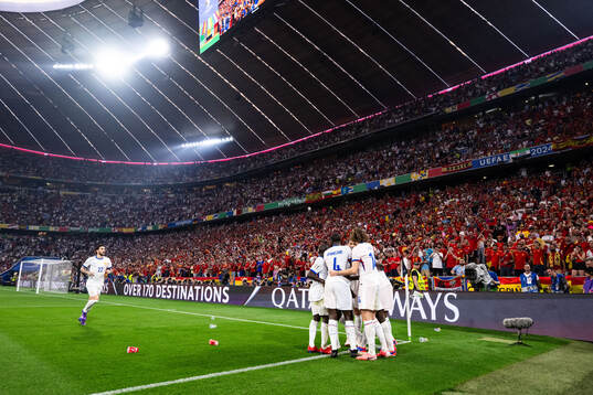 Randal Kolo Muani of France celebrates with team mates