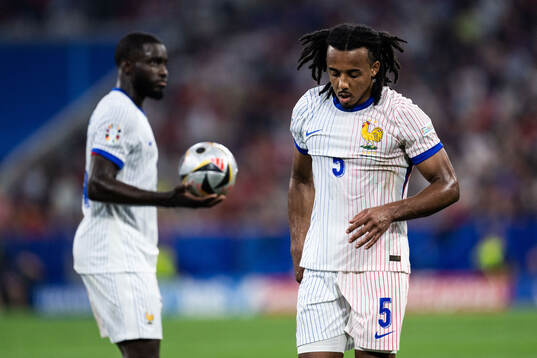 Jules Koundé of France looks dejected