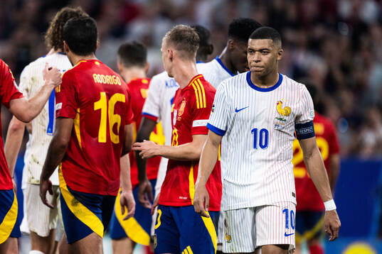 Kylian Mbappé of France looks dejected