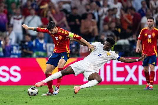 Alvaro Morata of Spain and Aurélien Tchouameni of France