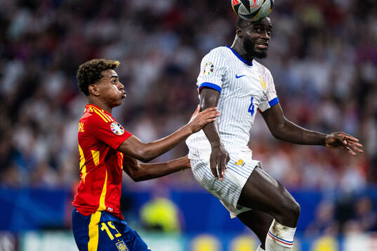Lamine Yamal of Spain and Dayot Upamecano of France