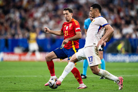 Mikel Oyarzabal of Spain and William Saliba aof France