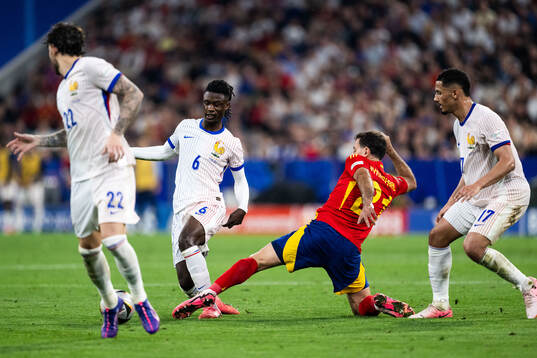 Eduardo Camavinga and William Saliba of France against
