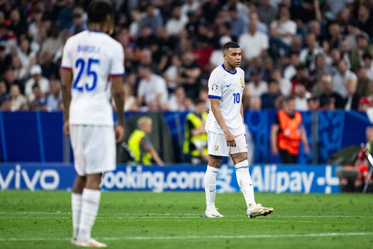 Kylian Mbappé of France looks dejected