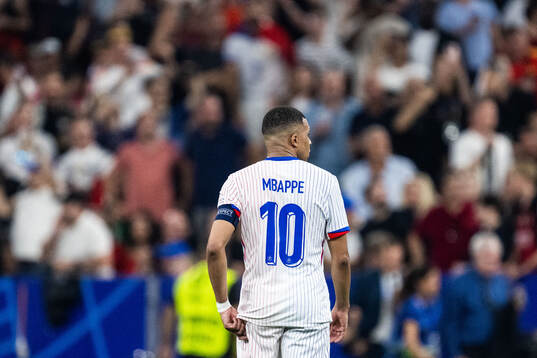 Kylian Mbappé of France looks dejected
