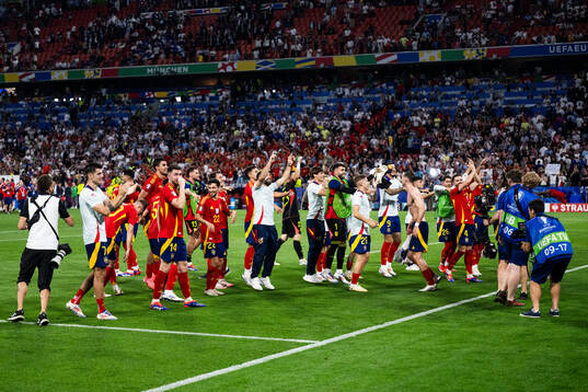 Players of Spain celebrate
