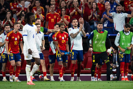 Lamine Yamal and Joselu of Spain celebrate