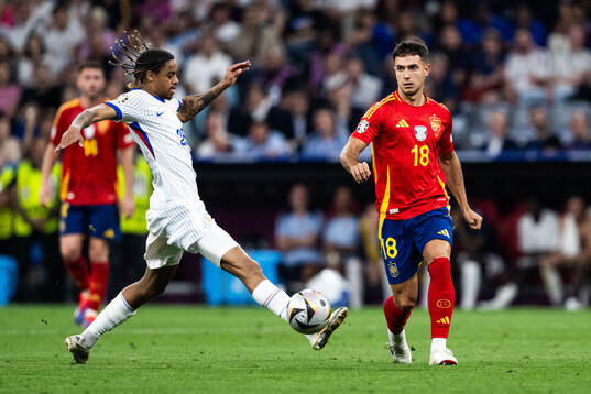 Bradley Barcola of France and Martin Zubimendi of Spain
