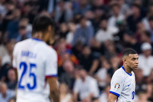 Kylian Mbappé of France looks dejected