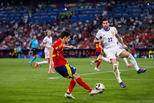 Jesus Navas of Spain and Theo Hernandez of France