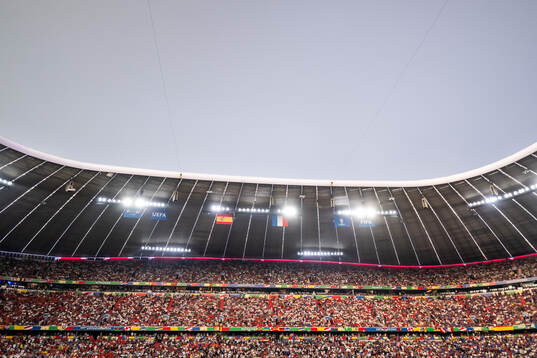 Spectators in the stands at Munich Football Arena