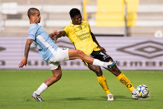 Pedro Henrique Rocha Pelagio of Pafos and Terry Yegbe of