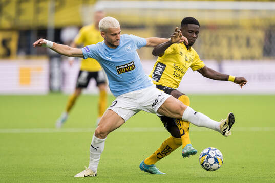 Vlad Dragomir of Pafos and Michael Baidoo of Elfsborg