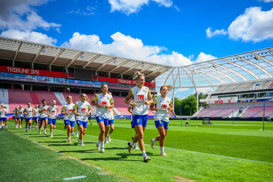 Players of the Swedish women's national football team warm