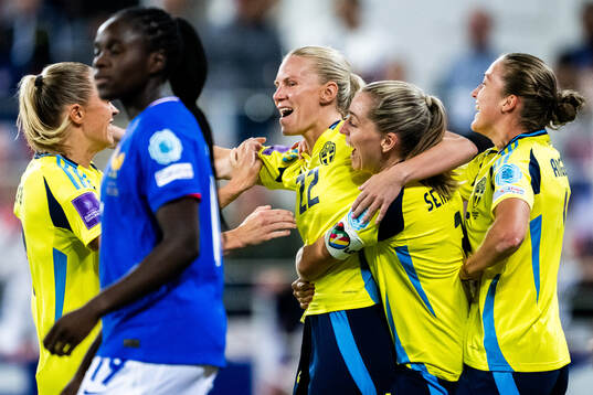 Josefine Rybrink of Sweden celebrates with teammates