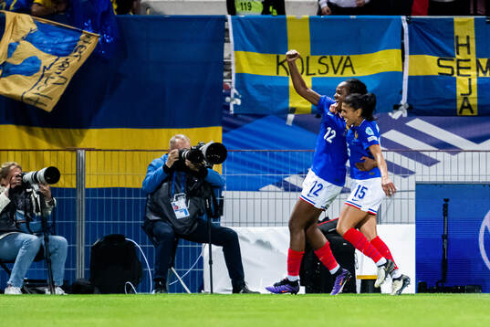 Estelle Cascarino and Kenza Dali of France celebrate