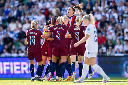 Ingrid Syrstad Engen and Vilde Bøe Risa of Norway celebrate