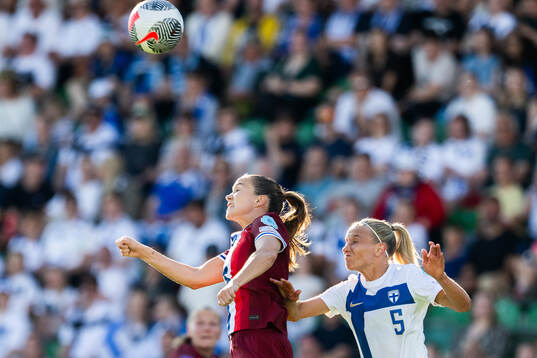 Guro Reiten of Norway and Emma Koivisto of Finland