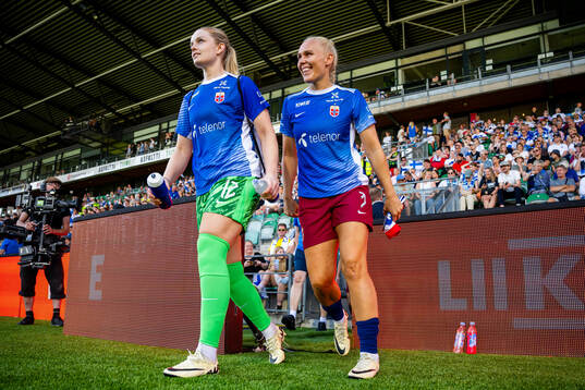 Goalkeeper Guro Pettersen and Maria Thorisdottir of Norway