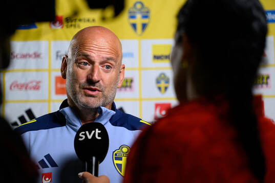 Assistant coach Magnus Wikman is being interviewed