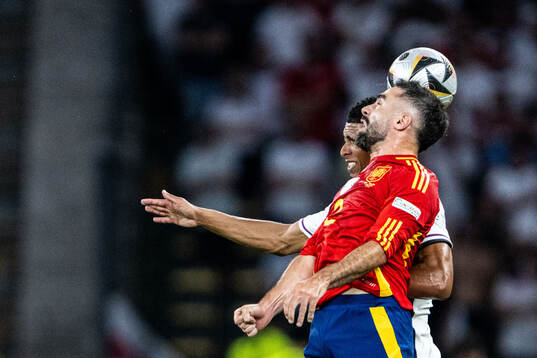 Jude Bellingham of England and Daniel Carvajal of Spain