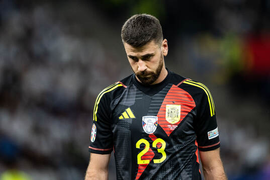 Goalkeeper Unai Simon Mendibil of Spain looks dejected