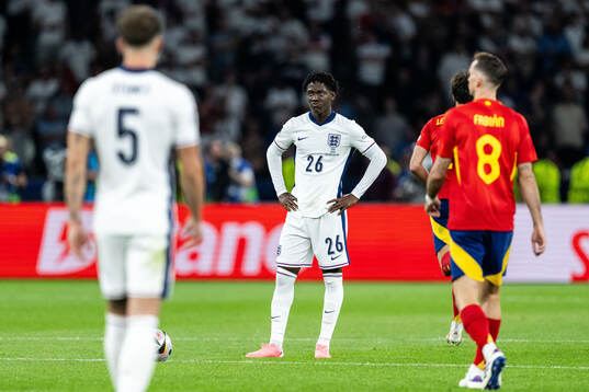 Kobbie Mainoo of England looks dejected
