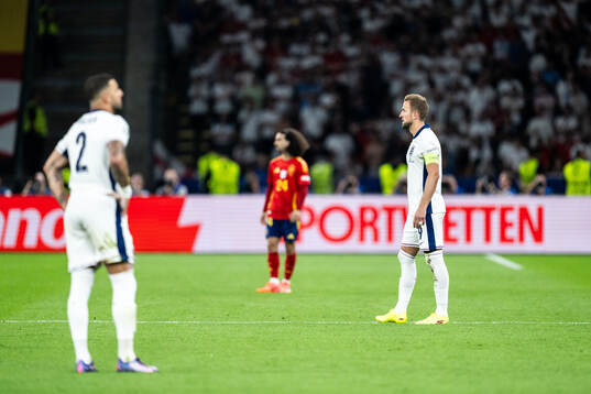 Harry Kane of England looks dejected