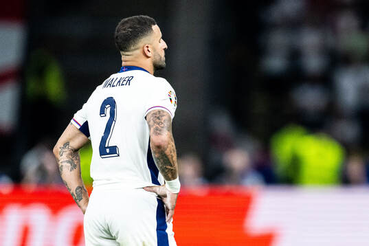 Kyle Walker of England looks dejected