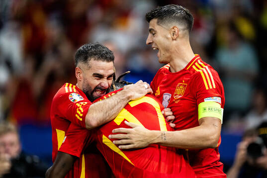 Nicholas Williams of Spain celebrates with Daniel Carvajal