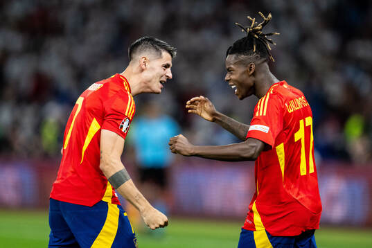 Nicholas Williams of Spain celebrates with Alvaro Morata