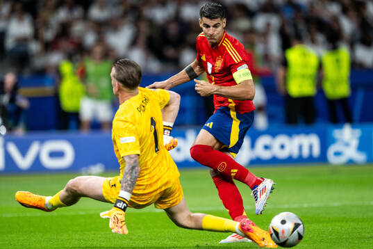 Goalkeeper Jordan Pickford of England and Alvaro Morata of