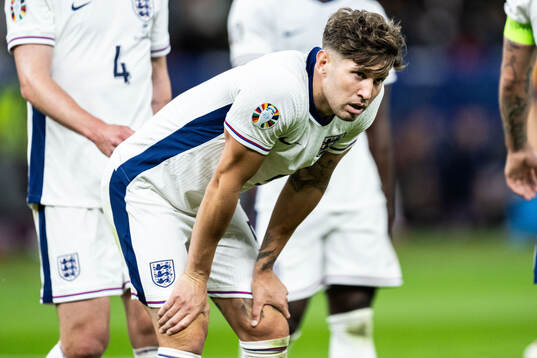 John Stones of England looks dejected