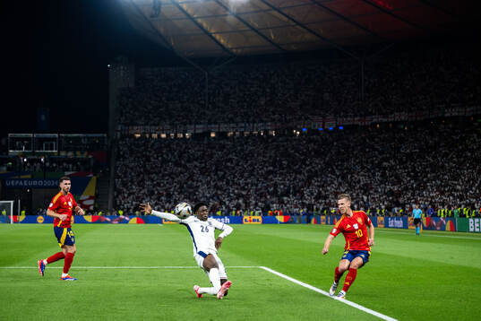 Kobbie Mainoo of England and Daniel Olmo of Spain