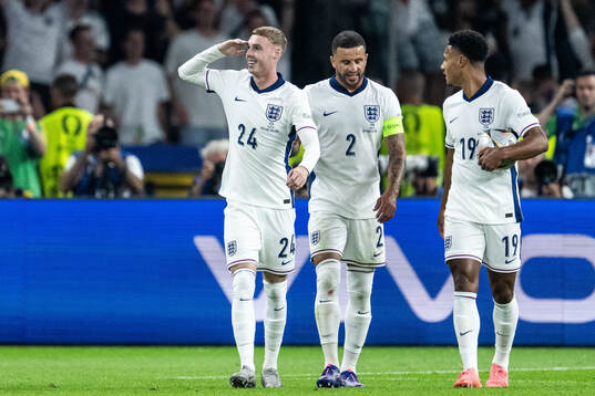Cole Palmer of England celebrates