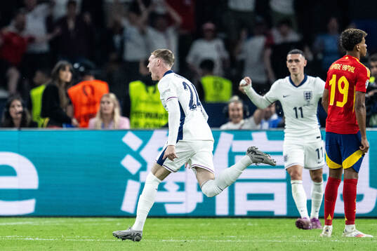 Cole Palmer of England celebrates