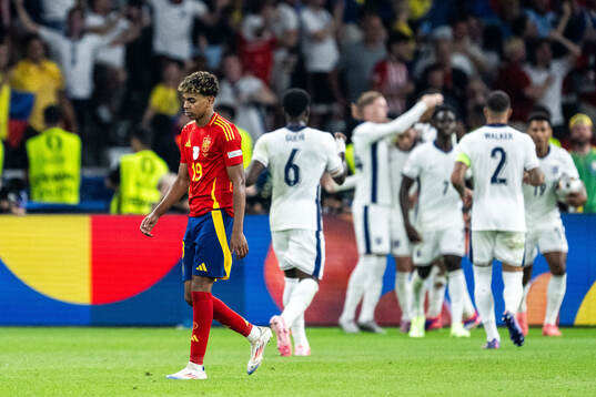 Lamine Yamal of Spain looks dejected