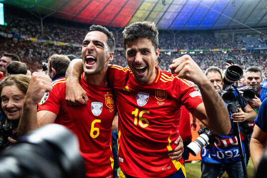 Mikel Merino and Rodrigo Hernandez of Spain celebrate