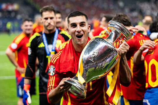 Ferran Torres of Spain celebrates with the trophy