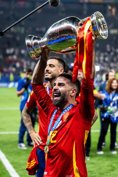 Daniel Carvajal of Spain celebrates with the trophy