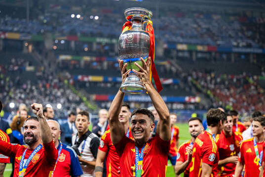Martin Zubimendi of Spain celebrates with the trophy