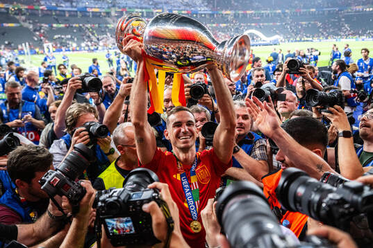 Fabian Ruiz Pena of Spain celebrates with the trophy