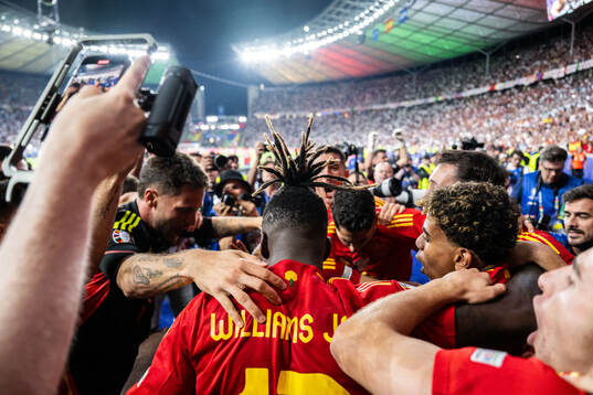 Nicholas Williams and Lamine Yamal of Spain celebrate
