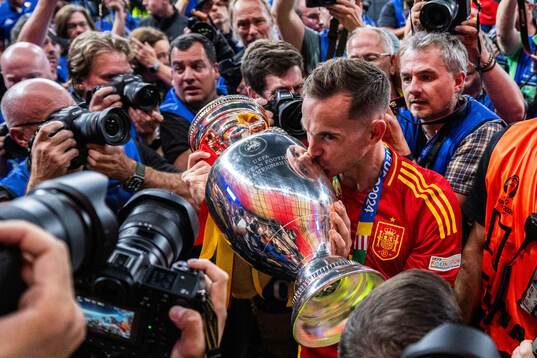 Fabian Ruiz Pena of Spain celebrates with the trophy