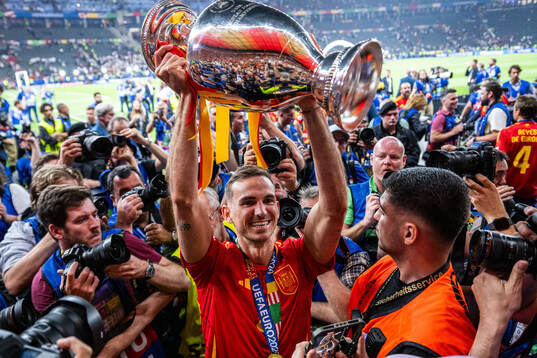 Fabian Ruiz Pena of Spain celebrates with the trophy